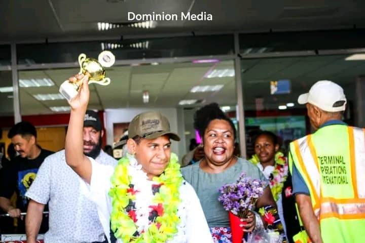 Papua New Guinea welcomed home one of its youngest international achievers as 13-year-old Nathaniel Aposol Kandakasi, a Grade 6 student at Paradise High School, returned to Port Moresby on Saturday after winning the IFLC – Colours of Voice Award in Germany.